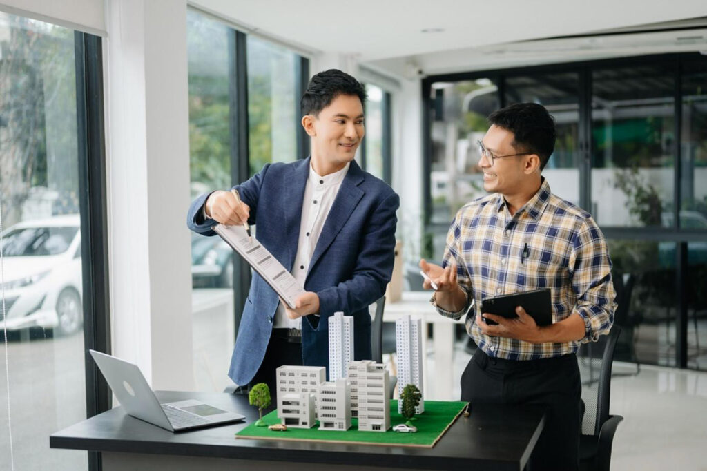 Real-estate-agent-showing-property-to-client-directly-offered-buy-property-developers