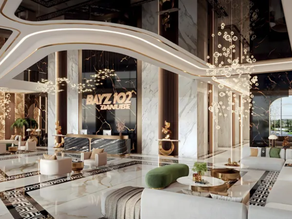 Luxurious lobby interior, featuring marble flooring, plush seating, and a grand chandelier.