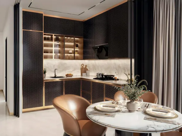 Modern kitchen and dining area at Bayz 102 by Danube Properties, featuring black cabinetry, marble countertops, and stylish bar stools.